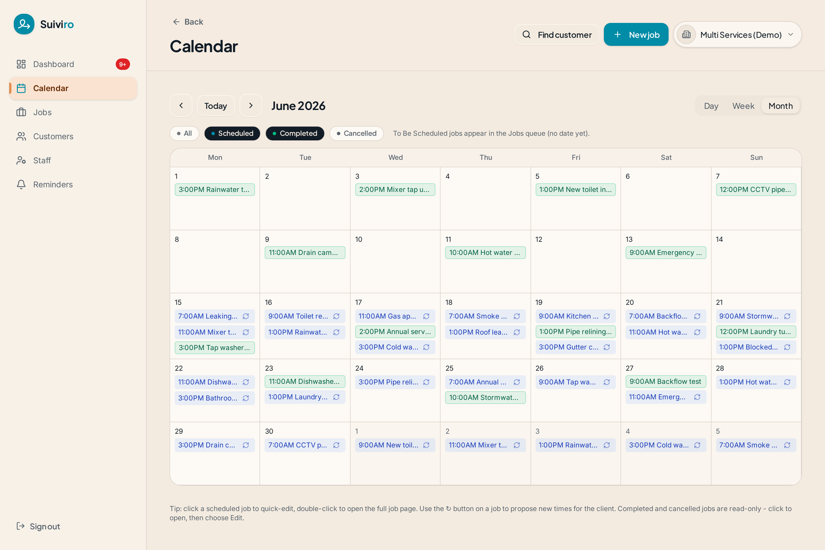 Populated month calendar view in Suiviro showing real bookings across the team